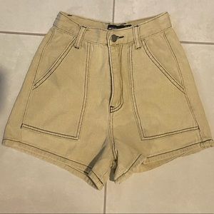 High waisted shorts with black stitching